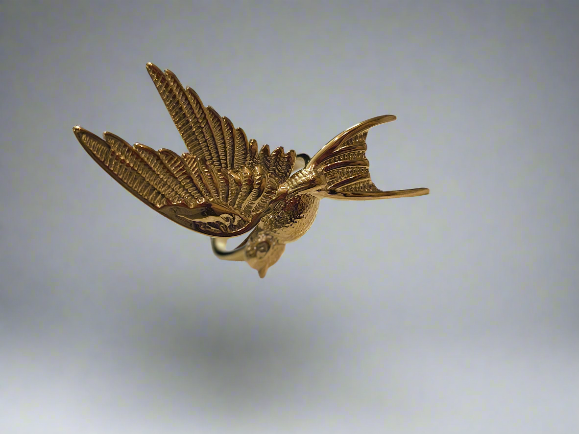 Golden bird ring