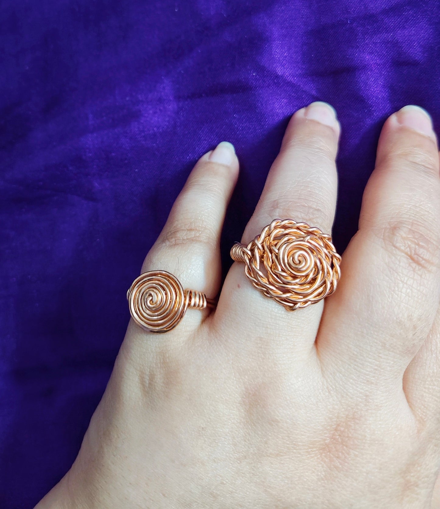 Gold rose and spiral rings