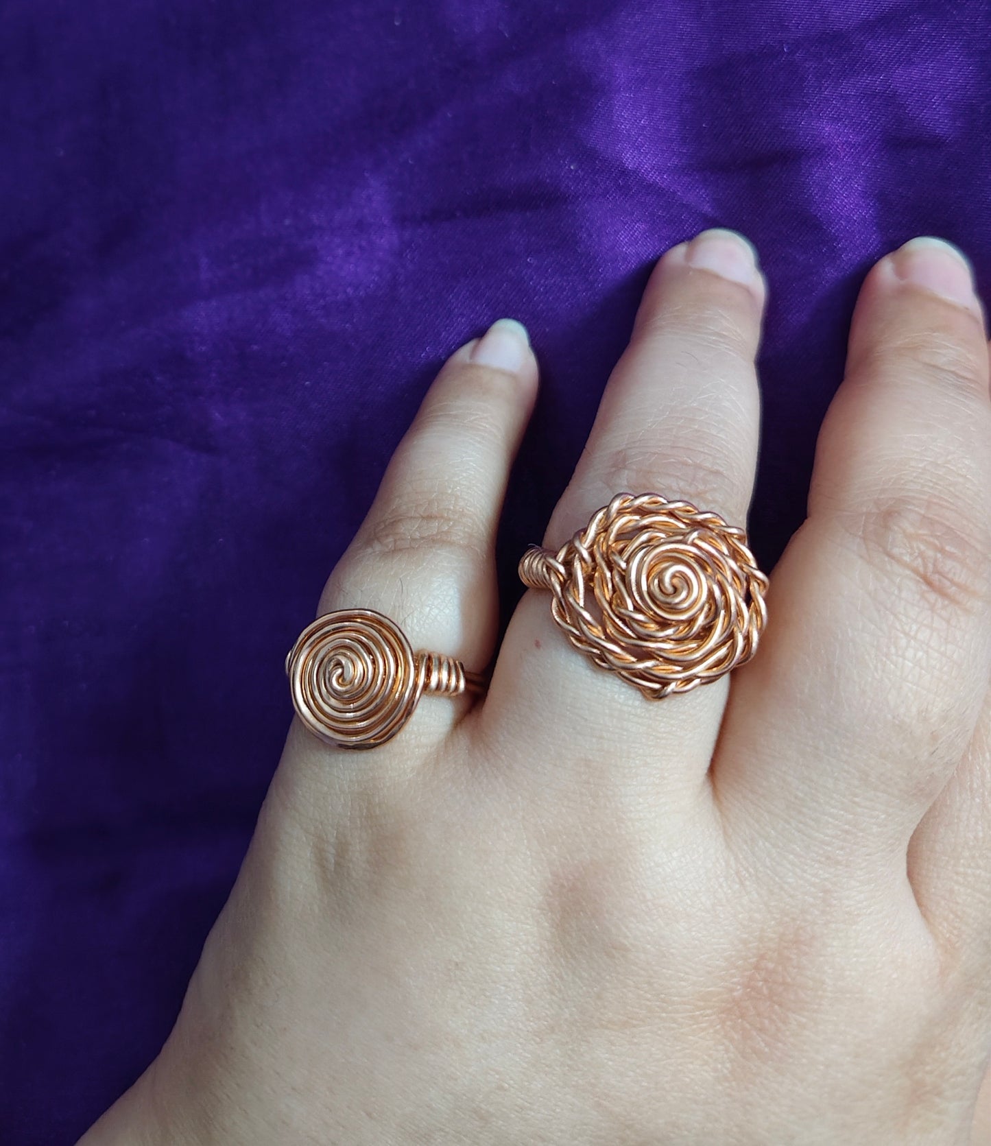 Gold rose and spiral rings